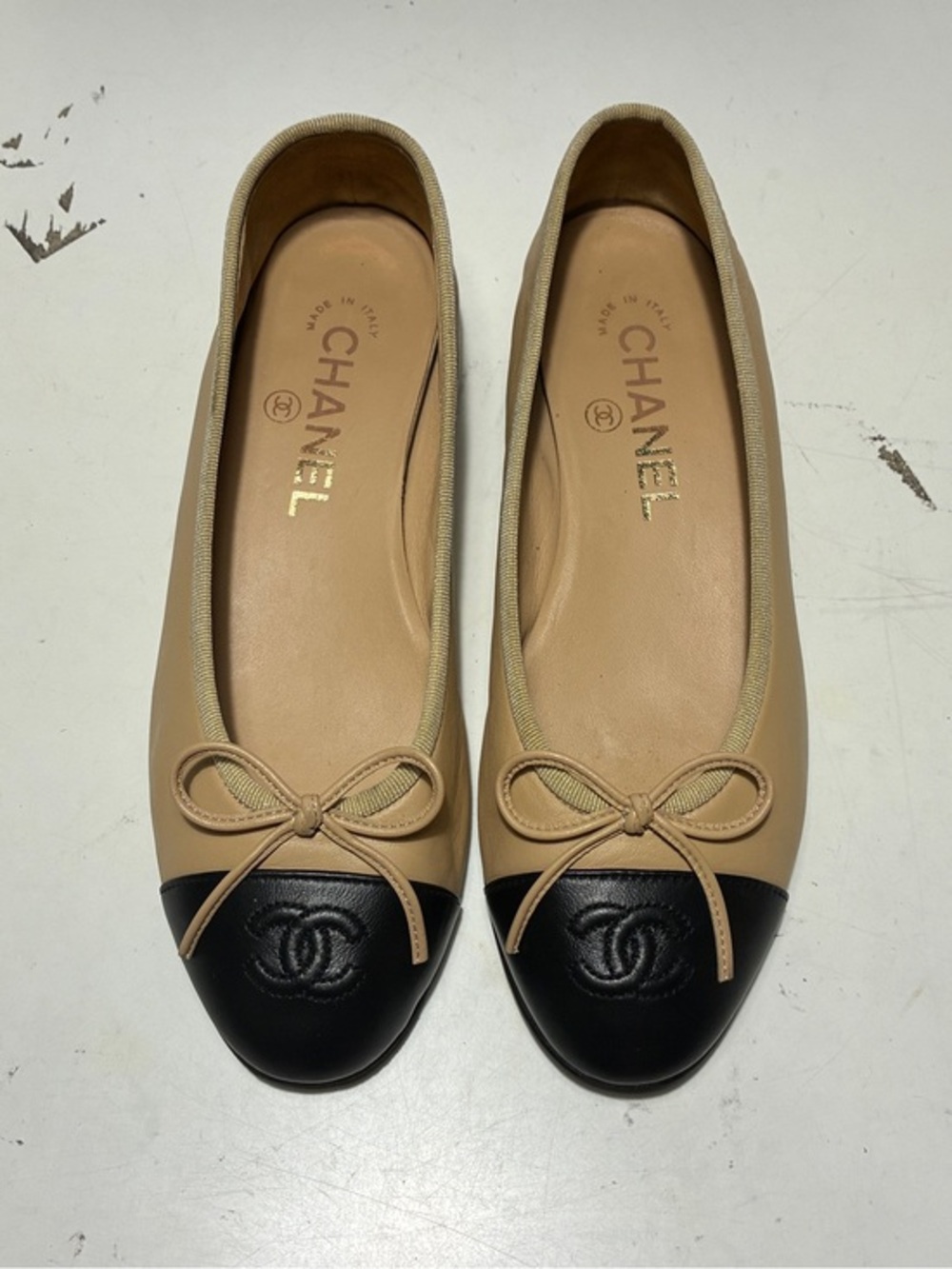 CHANEL Two-Tone Beige Leather Ballet Flats with Black Cap-Toe